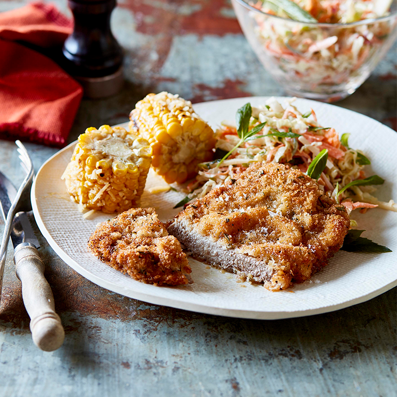 Rosemary schnitzel with coleslaw and corn